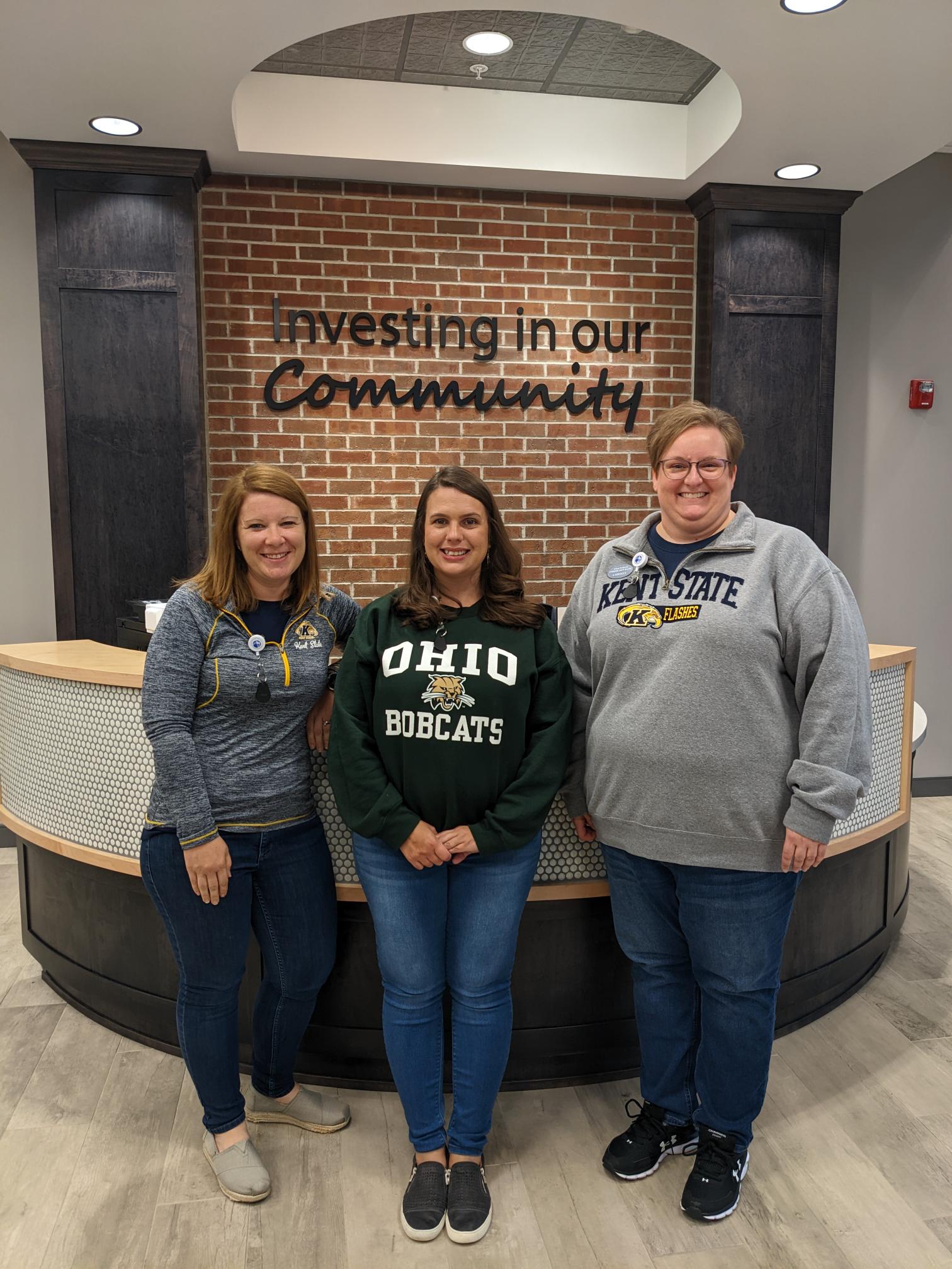 Employees proudly wear their favorite college gear during a themed spirit dress-down day